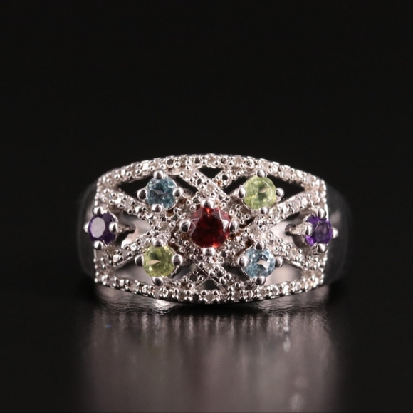 Sterling Silver Openwork Ring with Garnet, Blue Topaz, and Diamond Stone… - Picture 8 of 8